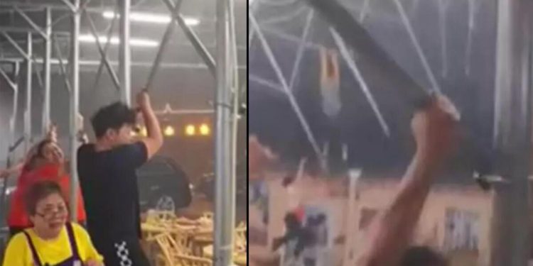 Çin’de şiddetli rüzgar tenteye tutunan insanları uçurdu