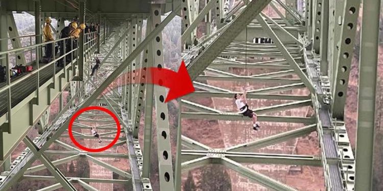 Görüntü çekmek için çıktı, köprüde asılı kaldı