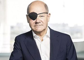 Scholz korsan bantlı fotoğrafını paylaştı