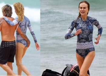 Güneş ışınlarından düşmanı üzere kaçıyor: Mayosu bile uzun kollu