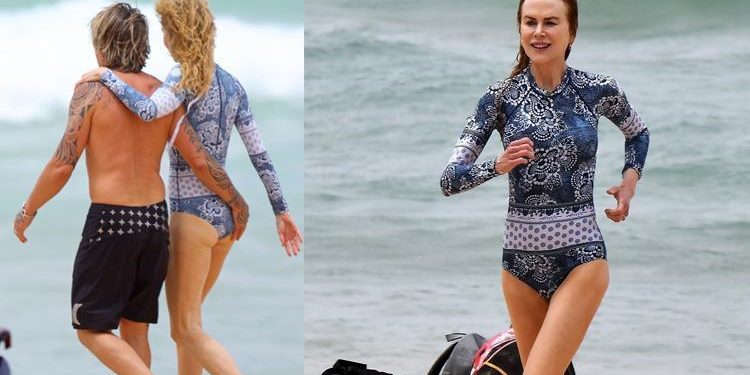 Güneş ışınlarından düşmanı üzere kaçıyor: Mayosu bile uzun kollu